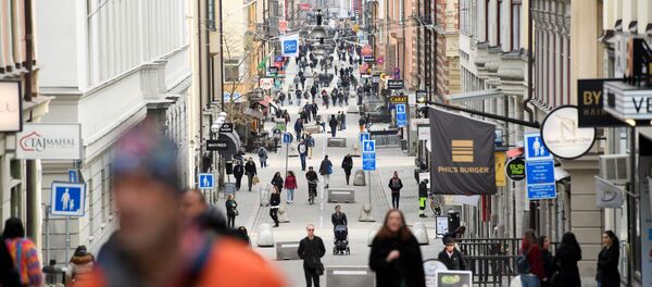 La calle Drottninggatan en Estocolmo, Suecia - Sputnik Mundo