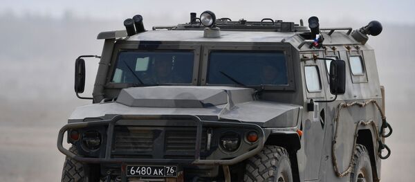 Todoterreno militar ruso Tigr (archivo) - Sputnik Mundo