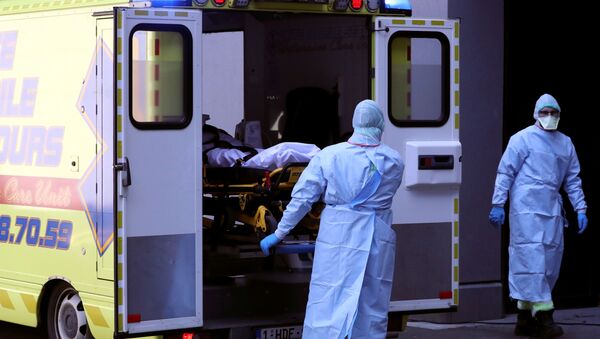 Una ambulancia de Lieja  - Sputnik Mundo