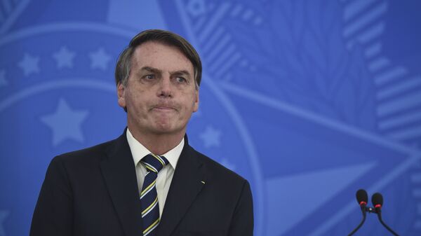 El presidente de Brasil, Jair Bolsonaro, durante una rueda de prensa - Sputnik Mundo