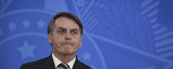 El presidente de Brasil, Jair Bolsonaro, durante una rueda de prensa - Sputnik Mundo