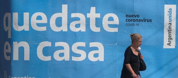 Cartel para que la gente se quede en casa en Buenos Aires, Argentina Cartel para que la gente se quede en casa en Buenos Aires, Argentina - Sputnik Mundo