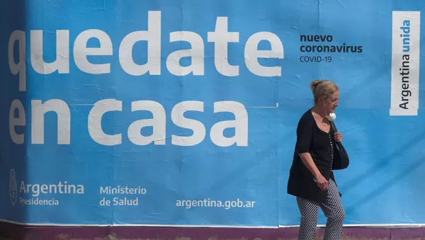 Cartel para que la gente se quede en casa en Buenos Aires, Argentina - Sputnik Mundo
