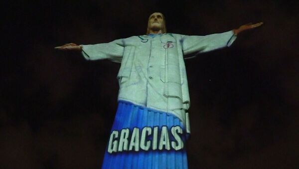 El Cristo Redentor rinde homenaje a los médicos en plena pandemia de COVID-19 - Sputnik Mundo