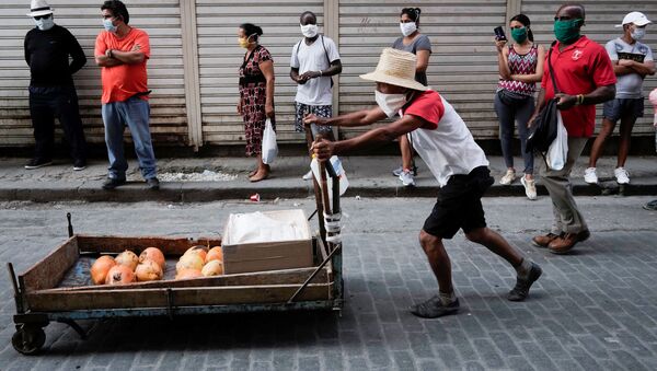 Cubanos en mascarillas (imagen referencial) - Sputnik Mundo