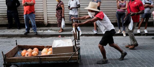 Cubanos en mascarillas (imagen referencial) - Sputnik Mundo