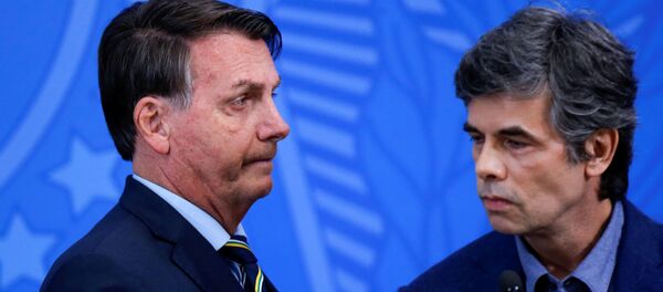 El presidente de Brasil, Jair Bolsonaro, junto al nuevo ministro de Salud, Nelson Teich - Sputnik Mundo
