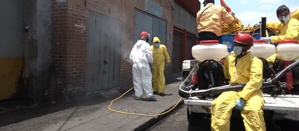 'El día nacional de desinfección': así limpian las calles de Caracas 'El día nacional de desinfección': así limpian las calles de Caracas - Sputnik Mundo