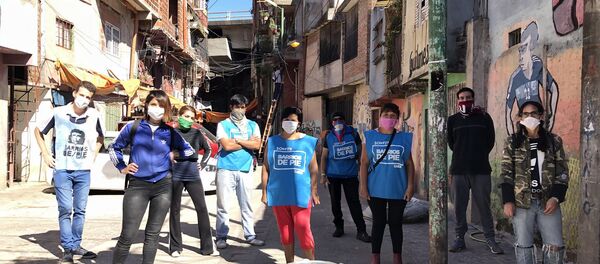 Militantes de Barrios de Pie en la Villa 31 Padre Carlos Mugica - Sputnik Mundo