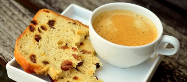 Una taza de café - Sputnik Mundo