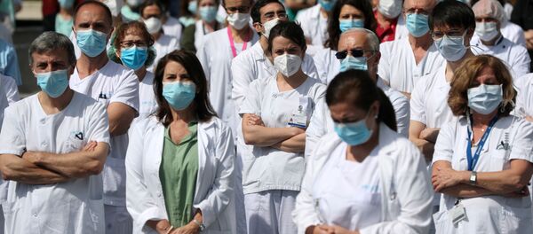 Médicos en España durante el brote del coronavirus - Sputnik Mundo