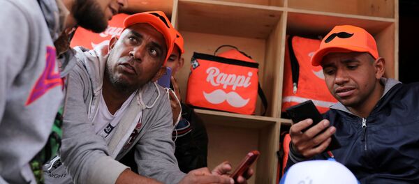 Trabajadores de la aplicación colombiana de repartos Rappi - Sputnik Mundo