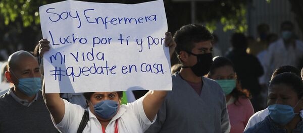 Una enfermera - Sputnik Mundo