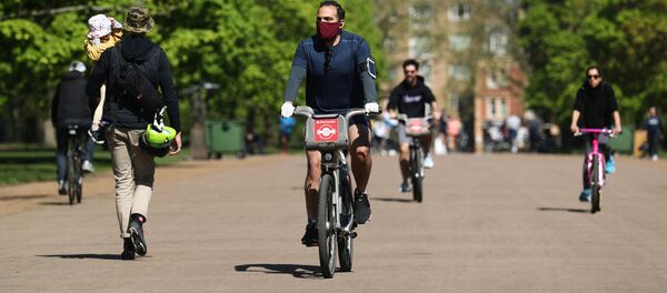 Gente en bicicletas en Londres - Sputnik Mundo