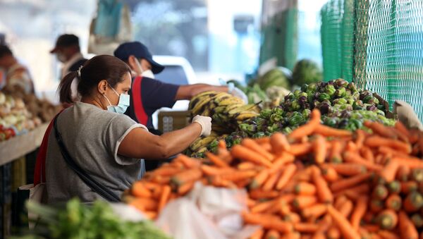 Un mercado en Caracas, Venezuela - Sputnik Mundo