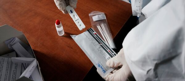 Un test para detectar el coronavirus Un test para detectar el coronavirus - Sputnik Mundo