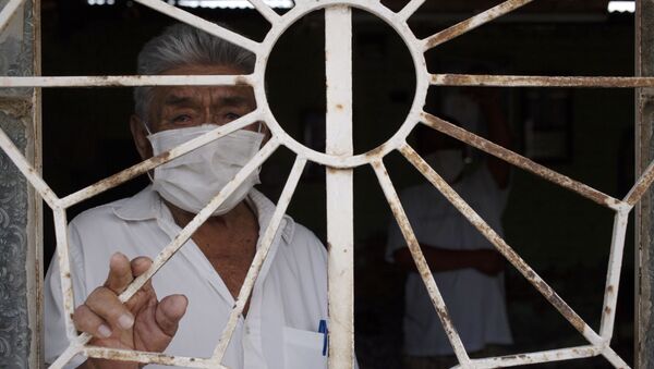 Un hombre en Piura, Perú - Sputnik Mundo