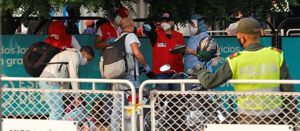 Migrantes venezolanos en la frontera entre Colombia y Venezuela - Sputnik Mundo