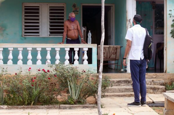 Médico cubano: las comunidades organizadas son la clave para vencer al COVID-19 - Sputnik Mundo