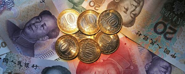 El rublo y el yuan, monedas de Rusia y China - Sputnik Mundo