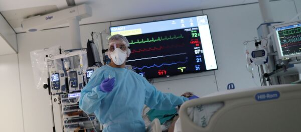 Un médico español Un médico español - Sputnik Mundo