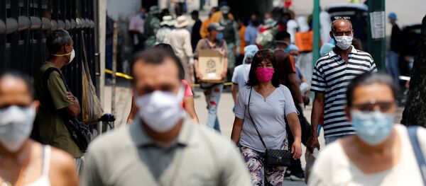 Personas en las calles de Caracas, Venezuela - Sputnik Mundo
