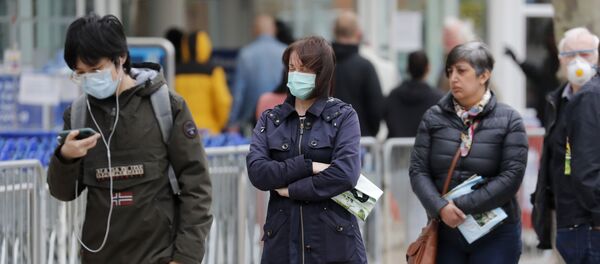 La gente haciendo cola en el Reino Unido - Sputnik Mundo