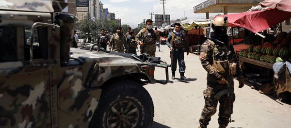 Las Fuerzas de Seguridad de Afganistán en el lugar del ataque en Kabul - Sputnik Mundo