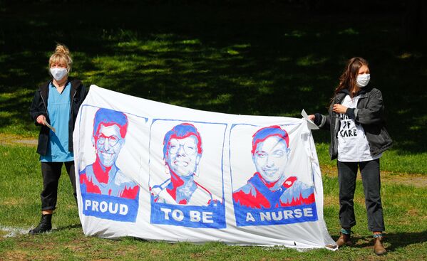 Nurses demonstrate in front of the Ministry of Economic Affairs, for higher pay and better working conditions - Sputnik Mundo