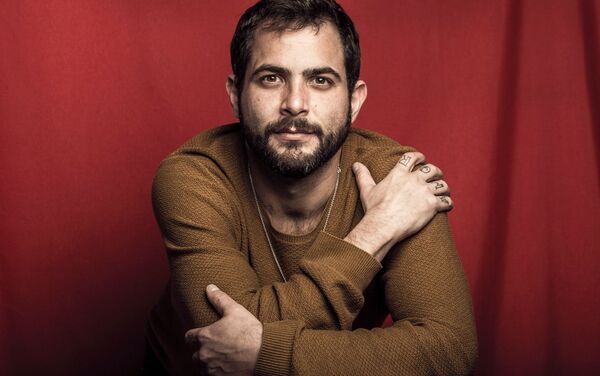 Jesús Mayorga es el fotógrafo y videógrafo del equipo - Sputnik Mundo