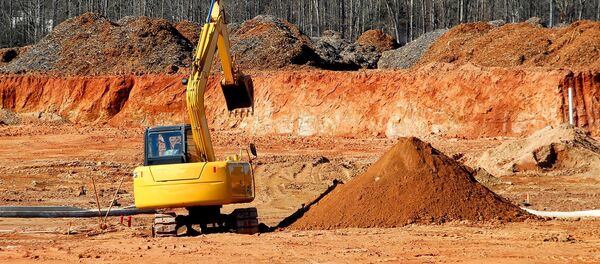 Una excavadora (imagen referencial) - Sputnik Mundo