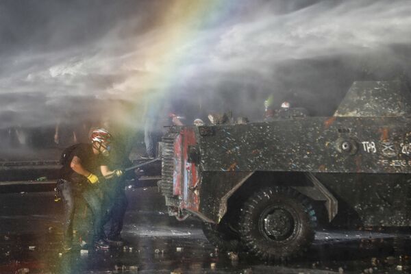 La inversión antiprotesta de Chile supera los 15 millones de dólares en plena pandemia - Sputnik Mundo