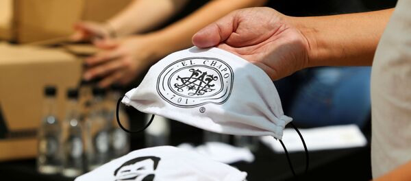 Mascarillas con la imagen y el nombre de Joaquin El Chapo Guzman - Sputnik Mundo