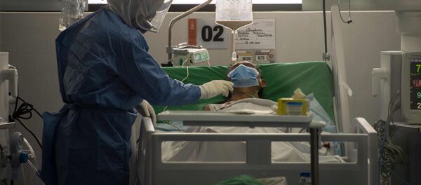 Un paciente con coronavirus en Quito, Ecuador Un paciente con coronavirus en Quito, Ecuador - Sputnik Mundo