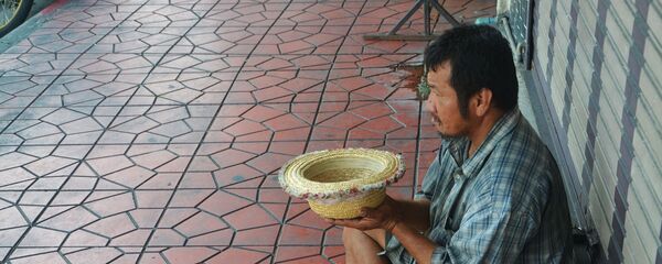 Una persona pobre (imagen referencial) - Sputnik Mundo