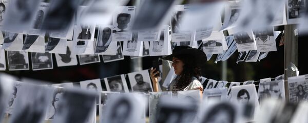 Fotos de desaparecidos en México (imagen referencial) - Sputnik Mundo