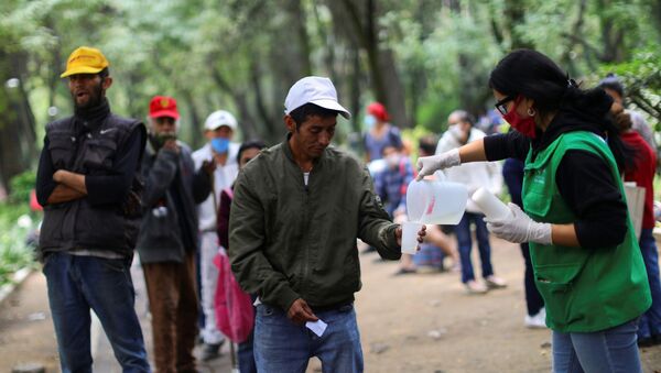 Filas para recibir comida en México Filas para recibir comida en México - Sputnik Mundo