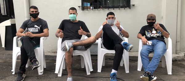 Colaboradores y residentes del Centro de Inclusión del Polideportivo Pereyra - Sputnik Mundo