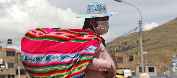 Una mujer indígena en Perú Una mujer indígena en Perú - Sputnik Mundo