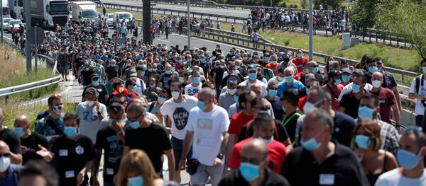 Protesta de los trabajadores de Nissan en Barcelona Protesta de los trabajadores de Nissan en Barcelona - Sputnik Mundo