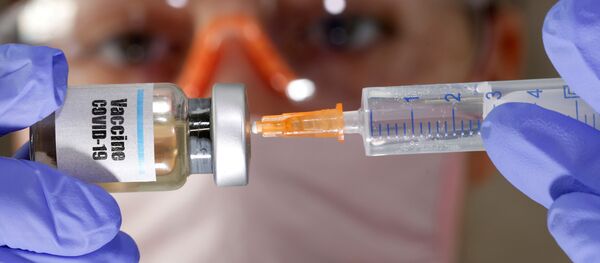 Elaboración de vacuna contra el COVID-19 (imagen referencial) - Sputnik Mundo