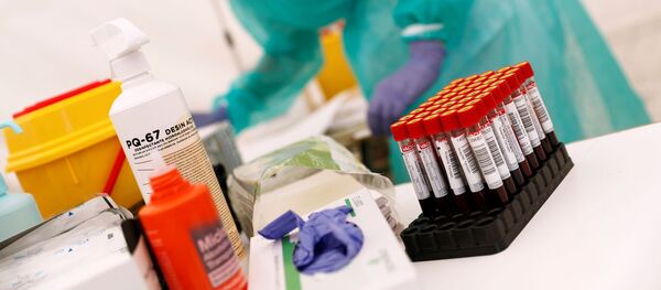 Unas pruebas de coronavirus Unas pruebas de coronavirus - Sputnik Mundo