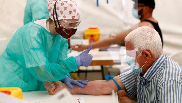 Un centro temporal de tests gratuitos al covid-19 en España - Sputnik Mundo