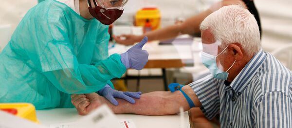 Un centro temporal de tests gratuitos al covid-19 en España - Sputnik Mundo