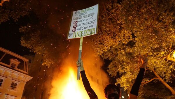 Las protestas y los disturbios desatados en Washington por la muerte del afroamericano George Floyd - Sputnik Mundo