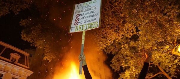 Las protestas y los disturbios desatados en Washington por la muerte del afroamericano George Floyd - Sputnik Mundo