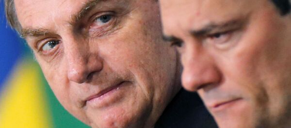 El presidene de Brasil, Jair Bolsonaro, y el exministro Sérgio Moro El presidene de Brasil, Jair Bolsonaro, y el exministro Sérgio Moro - Sputnik Mundo