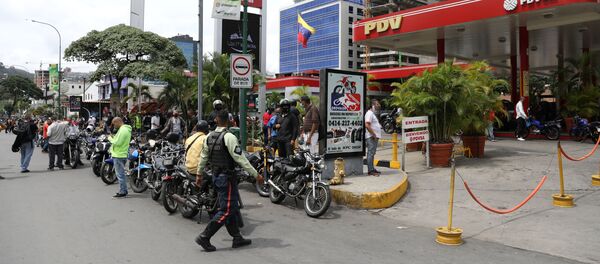 Una estación de servicio en Caracas - Sputnik Mundo