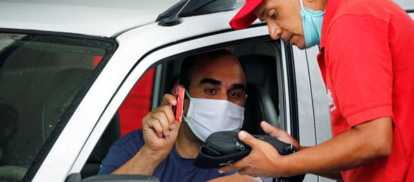Una estación de servicio en Caracas - Sputnik Mundo