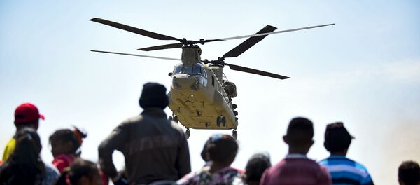 Helicóptero estadounidense llegando a una zona fronteriza de Colombia con Venezuela - Sputnik Mundo
